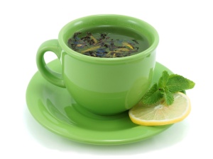 Cup with green tea, with mint and  lemon